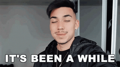 Man Smiling With Eyes Closed Says Been A While GIF