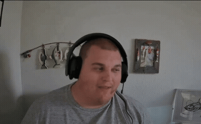 Man Smiling With Headphones And Well Well GIF