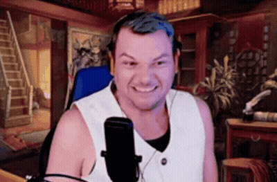 Man Smiling With Headphones At Microphone GIF