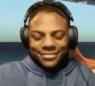 Man Smiling With Headphones GIF