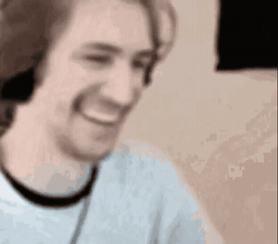 Man Smiling With Headphones GIF