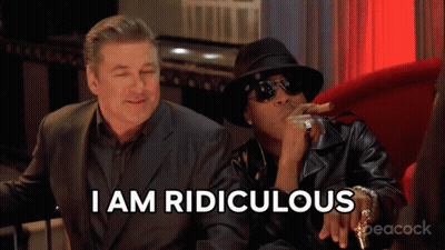 Man Smoking Cigar Next To Another Man Saying I Am Ridiculous GIF