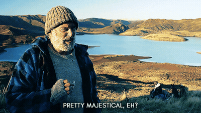 Man Smoking Cigarette By Lake Says Pretty Majestical GIF