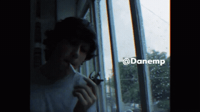 Man Smoking Cigarette By Window @Danemp GIF