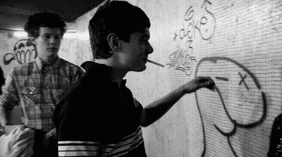 Man Smoking Cigarette Drawing On Wall GIF