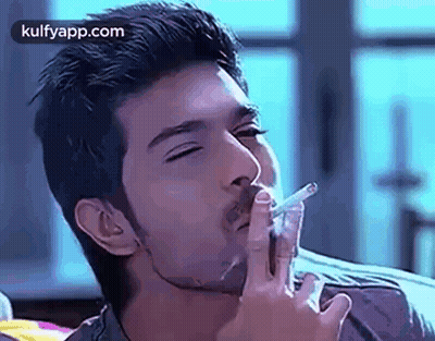 Man Smoking Cigarette Eyes Closed Mouth Open GIF