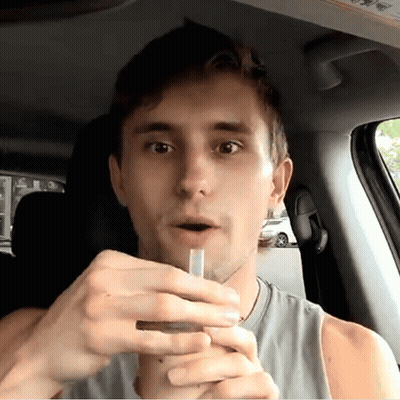 Man Smoking Cigarette In Car GIF
