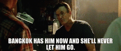 Man Smoking Cigarette Talking About Bangkok GIF