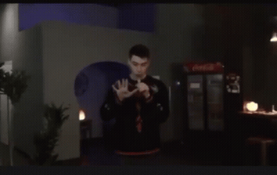 Man Smoking Hookah In Dark Room GIF