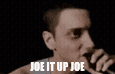 Man Smoking In Dark Room Says Joe It Up Joe GIF