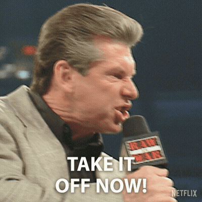 Man Speaking Into Mic Saying Take It Off Now GIF