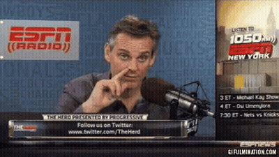 Man Speaking Into Microphone In Front Of ESPN Radio Sign GIF