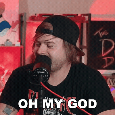 Man Speaking Into Microphone Oh My God Shirt GIF