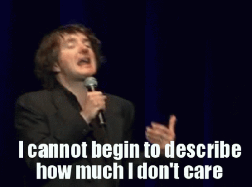 Man Speaking Into Microphone Saying I Cannot Begin To Describe How Much I Don't Care GIF