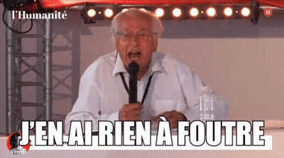 Man Speaking Into Microphone Saying J'en Ai Rien A Foutre GIF