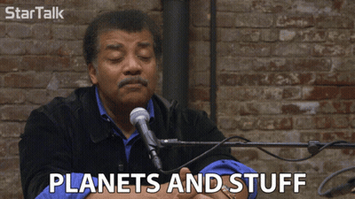 Man Speaking Into Microphone Saying Planets And Stuff GIF