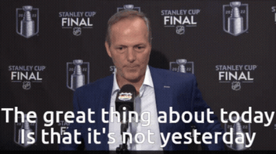 Man Speaking Into Microphone Stanley Cup Final Sign GIF