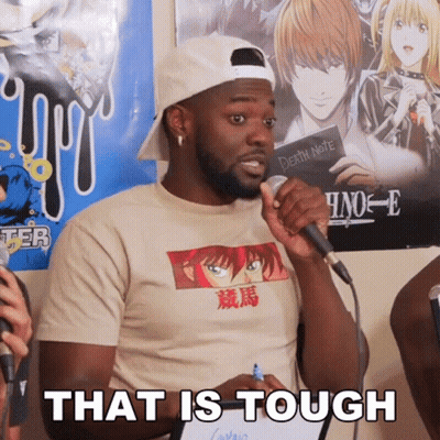 Man Speaking Into Microphone That Is Tough GIF