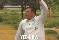 Man Spinning Hat Yeehaw GIF