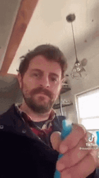 Man Spray Bottle Meme GIF