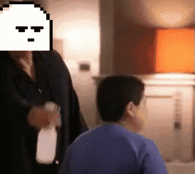 Man Spraying Child With Spray Bottle GIF