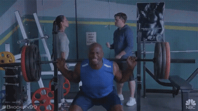 Man Squatting Barbell In Gym Brooklyn 99 GIF