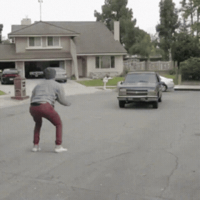 Man Squatting In Front Of Chevrolet Truck GIF