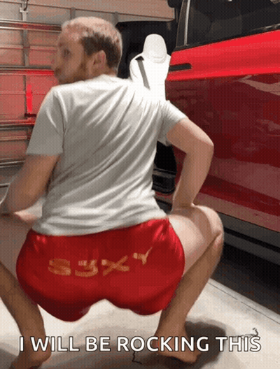 Man Squatting In Front Of Red Car Saying I Will Be Rocking This GIF