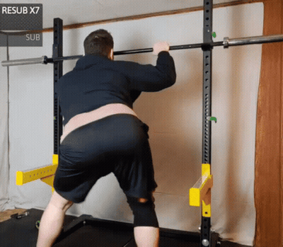 Man Squatting In Front Of Resub X7 Sub Sign GIF