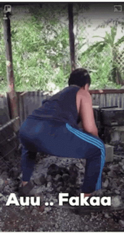 Man Squatting On Rocks Saying Auu Fakaa GIF