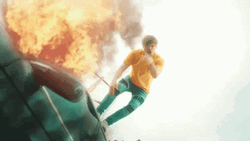 Man Standing Above Car Explosion GIF