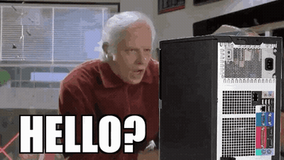 Man Standing At Computer Says Hello? GIF