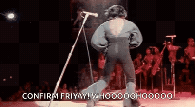 Man Standing At Microphone On Stage GIF