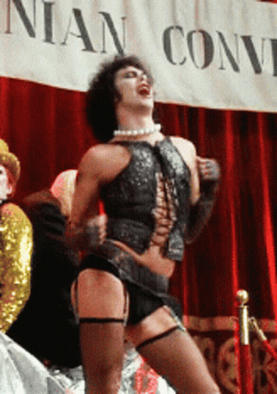 Man Standing At Nian Convention Banner GIF
