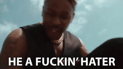 Man Standing Before Blue Sky Hater GIF