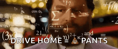 Man Standing Before Chalkboard With Equations GIF
