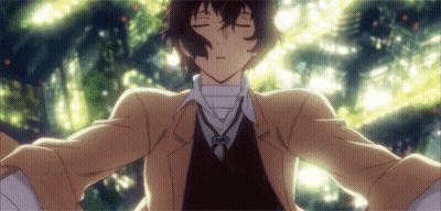 Man Standing Before Christmas Tree Eyes Closed GIF