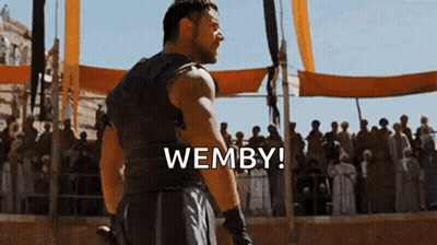 Man Standing Before Crowd Saying Wemby GIF