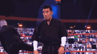 Man Standing Before Img Wrestl Sign GIF