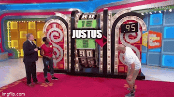 Man Standing Before Justus Game Board GIF
