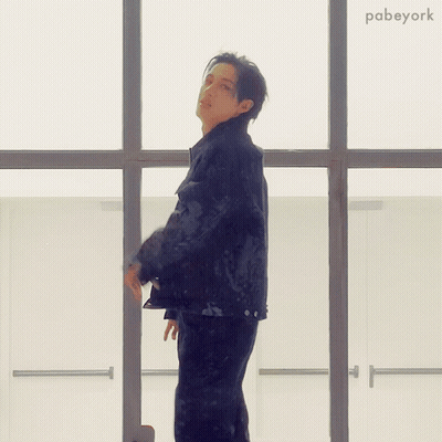 Man Standing Before Large Window With Pabeyork GIF