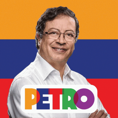 Man Standing Before Petro Flag GIF