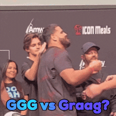 Man Standing Before Sign Saying GG Vs Graag GIF