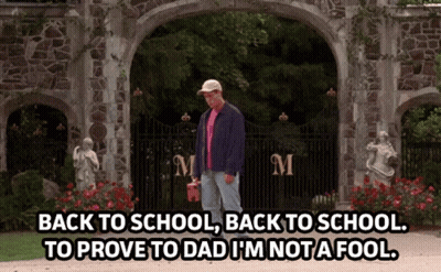 Man Standing Before Stone Archway GIF