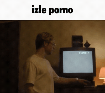 Man Standing Before TV Saying Izle Porno GIF
