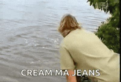 Man Standing By Water Saying Cream Ma Jeans GIF
