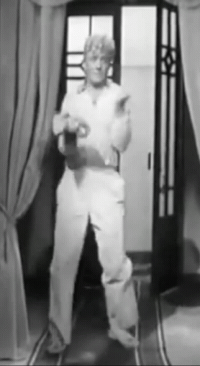 Man Standing In Doorway GIF