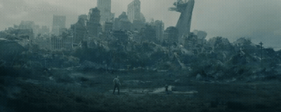 Man Standing In Earthquake-Damaged City GIF