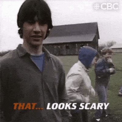Man Standing In Field With Group Of People GIF