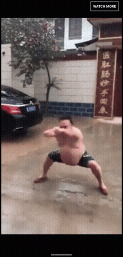 Man Standing In Flooded Area With Watch More Sign GIF